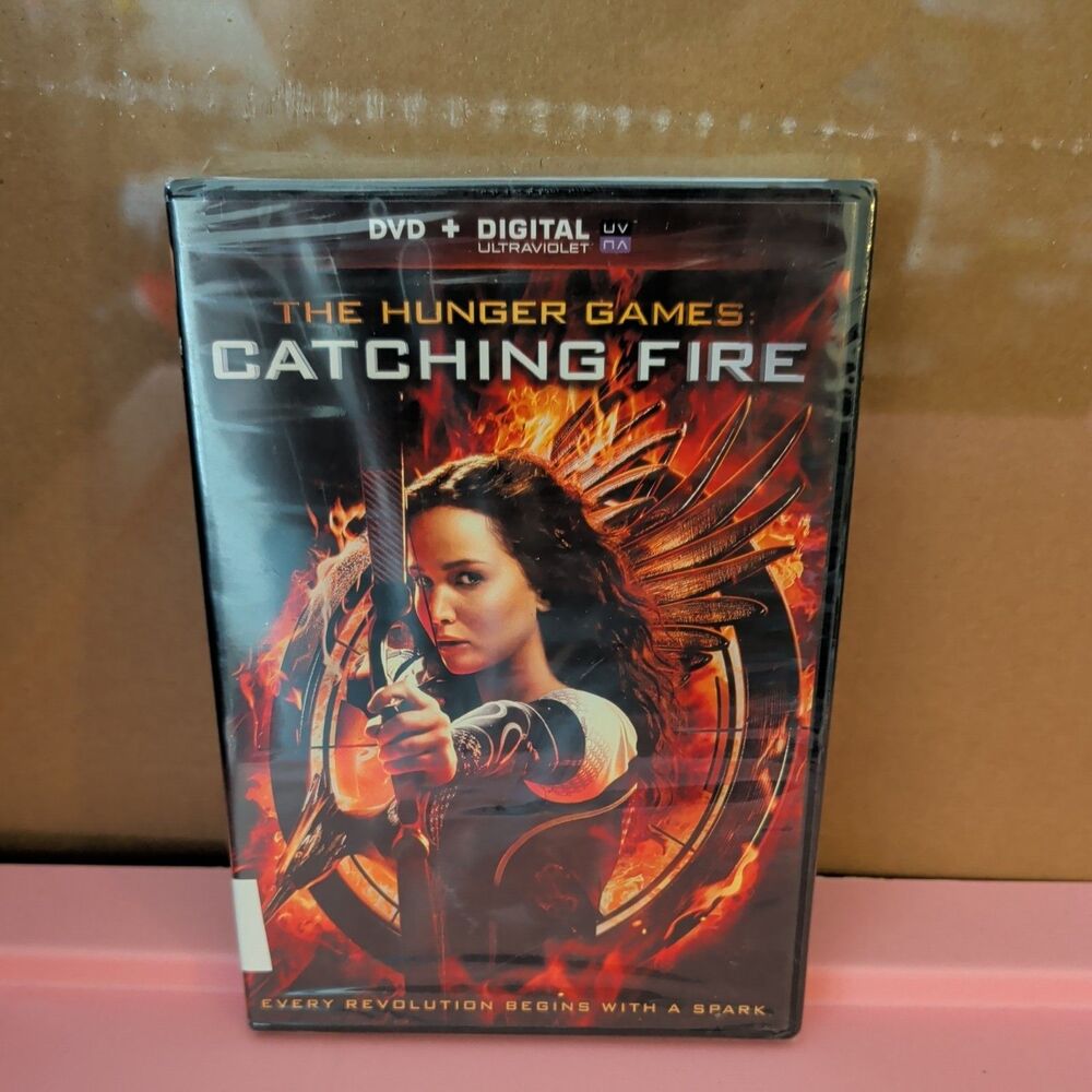 CATCHING FIRE RATED PG-13  Brand New